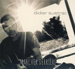 Marcher derrière | Sustrac, Didier (1959-....). Chanteur. Compositeur. Parolier. Musicien. Guitare. Clavier - non spécifié. Ukulele. Programmeur